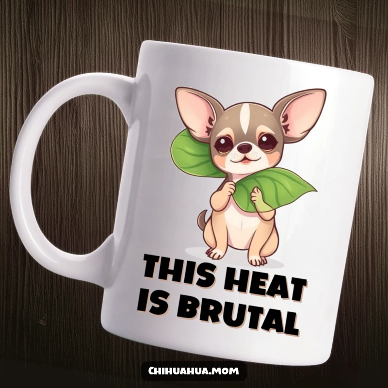 Funny tiny chihuahua dramatically fanning itself with a big leaf, looking hot and bothered on a mug.