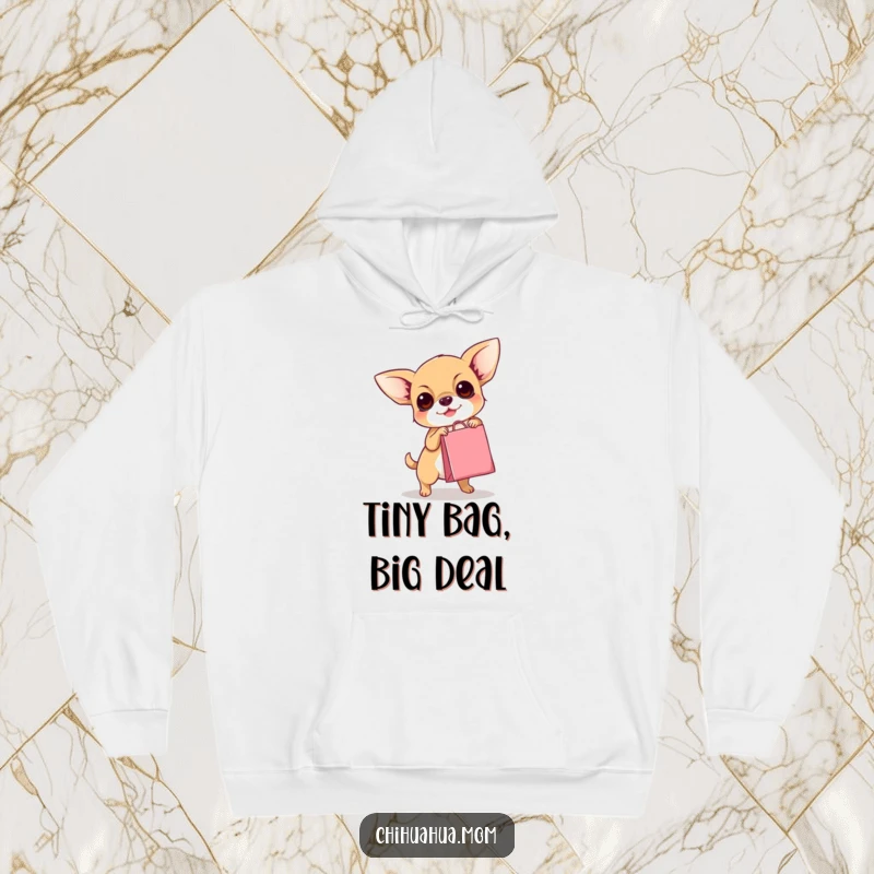 Funny Chihuahua Hoodie: Adorable dog trying its best to haul a comically small shopping bag, ready for adventure.