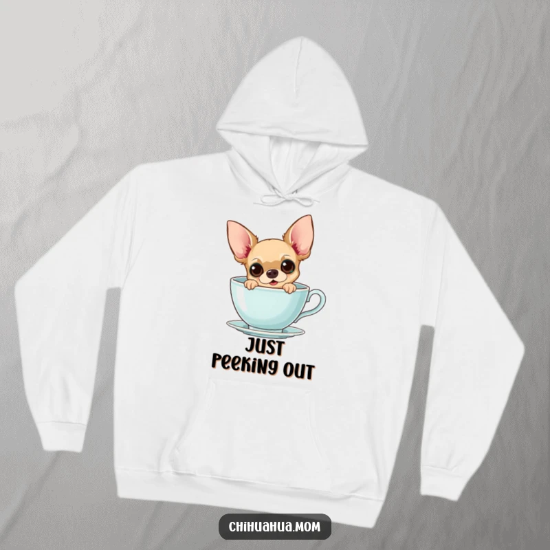Funny Chihuahua Teacup Hoodie: A curious chihuahua peeks from a giant teacup with wide eyes, warm and cozy, gift.