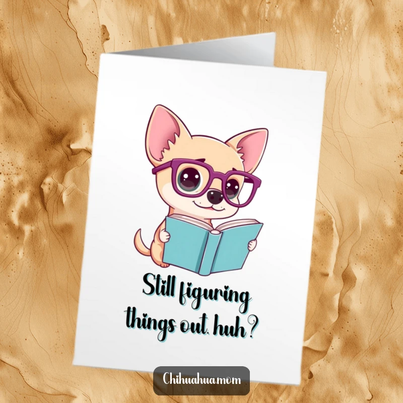 Funny Free Printable Birthday Card features a chihuahua in oversized glasses looking utterly bewildered by an open book.